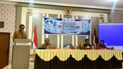 Sekda Parigi Moutong Zulfinasran membuka forum evaluasi peningkatan layanan kesehatan ibu dan anak.